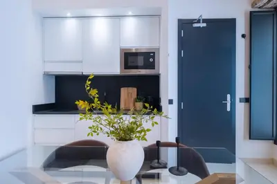 Una cocina o zona de cocina en Luxurious studio located in Casa Pilatos