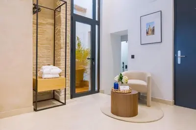 Cama o camas de una habitación en Luxurious studio with Jacuzzi in Casa Pilatos