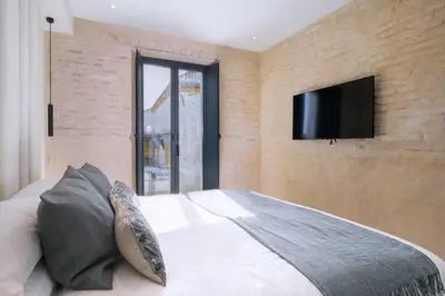 Cama o camas de una habitación en Luxurious Duplex - bathtub - 2Bd 2Bth Casa Pilatos