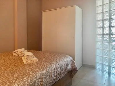 Cama o camas de una habitación en Nervion Plaza Dodo Apartment