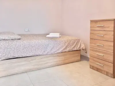 Cama o camas de una habitación en Nervion Plaza Dodo Apartment
