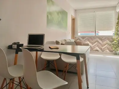Una televisión o centro de entretenimiento en Santa Justa Dodo Apartment
