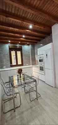 Una cocina o zona de cocina en Relator Suites