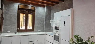 Una cocina o zona de cocina en Relator Suites