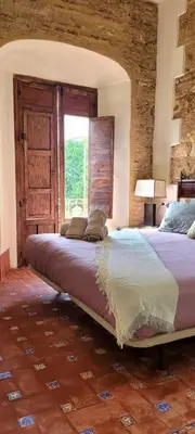 Cama o camas de una habitación en Palacio de los Angulo casa histórica en el centro de Córdoba
