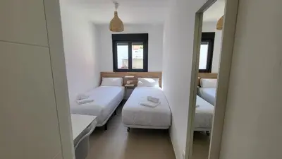 Cama o camas de una habitación en RentalSevilla San Juan de La Salle