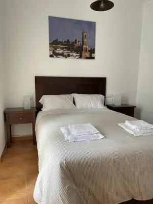 Cama o camas de una habitación en Apartamento Puerta del Perdón