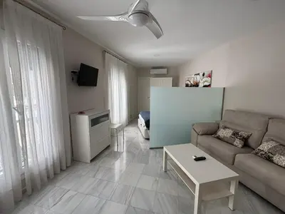 Una televisión o centro de entretenimiento en Casa Yaye Centro Écija