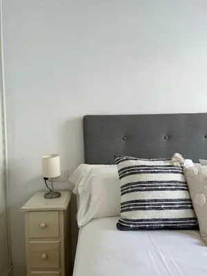 Cama o camas de una habitación en Balcones de Jauregui Premium Apartment