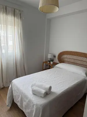 Cama o camas de una habitación en Alojamiento Carioca