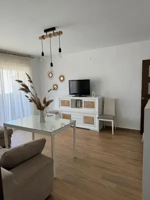 Una televisión o centro de entretenimiento en Alojamiento Carioca