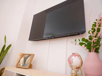 Una televisión o centro de entretenimiento en Traveller Award 2026 - El descanso de Wallada- Tranquilidad y Confort