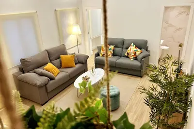Zona de estar de Auxiliadora Luxury