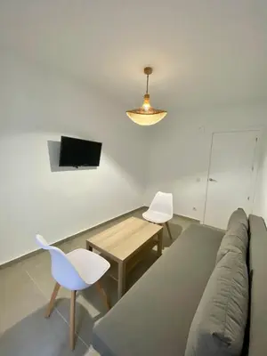 Una televisión o centro de entretenimiento en 9752 Apartamento Corte Ingles