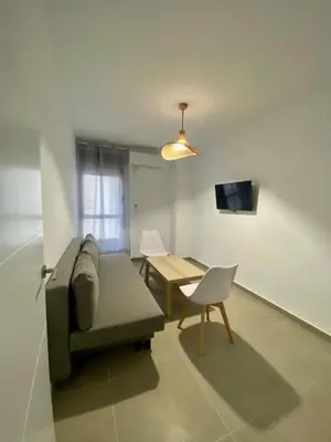 Una televisión o centro de entretenimiento en 9752 Apartamento Corte Ingles