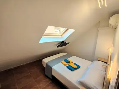 Cama o camas de una habitación en Ático Centro Antequera