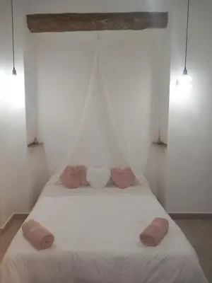 Cama o camas de una habitación en EL RINCON DEL ROMERAL