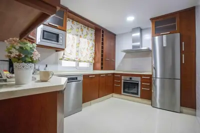 Una cocina o zona de cocina en Prada Suite Home
