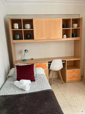 Cama o camas de una habitación en Cozy apartment next to center