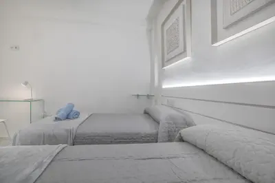 Cama o camas de una habitación en Apartamentos Haranas II & Parking