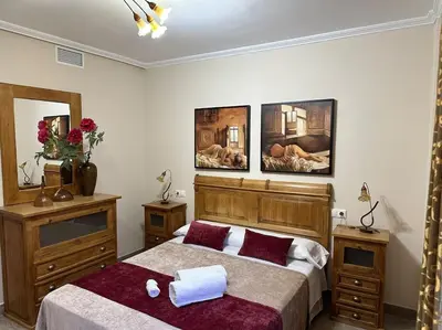 Cama o camas de una habitación en Piso en Linares zona centro con parking gratis