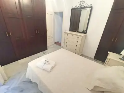 Cama o camas de una habitación en EL TESORILLO