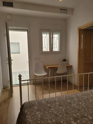 Cama o camas de una habitación en Apartamento con WiFi y aparcamiento privado