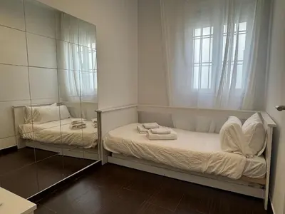 Cama o camas de una habitación en El Rincón del Azahar, dúplex con encanto