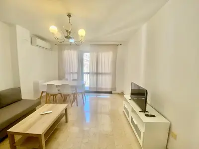 Una televisión o centro de entretenimiento en 9753 Apartamento Corte Ingles