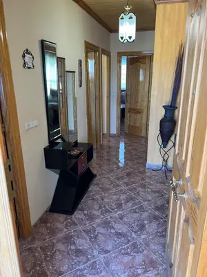 Una televisión o centro de entretenimiento en Casa Rural Las Eras de Campotejar
