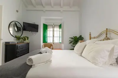 Cama o camas de una habitación en Alcazares Central Suite by Valcambre