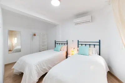 Cama o camas de una habitación en Apartamento JUDA Centro Cordoba