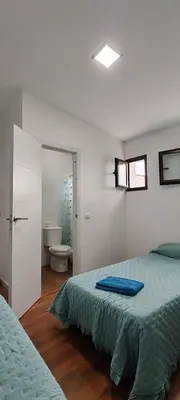Cama o camas de una habitación en Apartamento Karmo