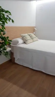 Cama o camas de una habitación en La Alcoba