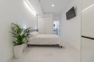 Cama o camas de una habitación en Loft Miguel Angel Home