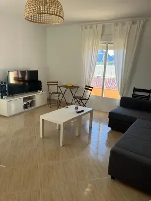 Una televisión o centro de entretenimiento en Alojamiento turístico Noalejo ( Granada/ Jaén )