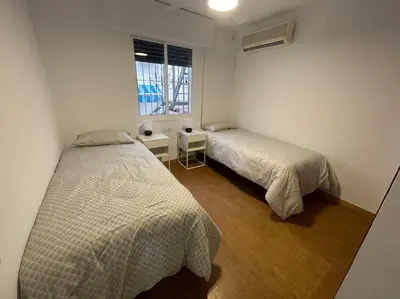 Cama o camas de una habitación en Dos hermanas - Feel at home