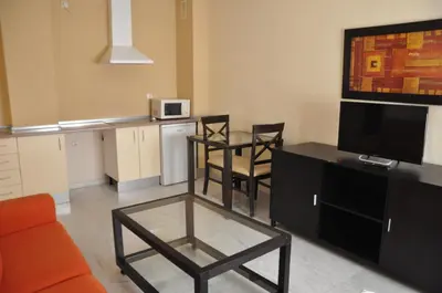 Una cocina o zona de cocina en Apartamentos Luxsevilla Palacio