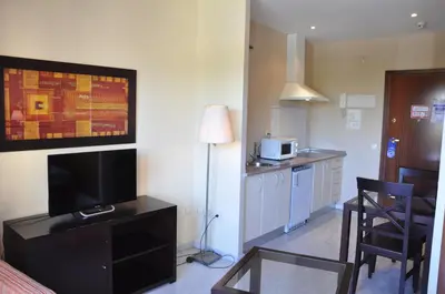 Una cocina o zona de cocina en Apartamentos Luxsevilla Palacio