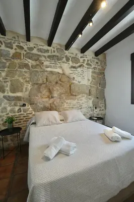 Cama o camas de una habitación en Romero Suites 2