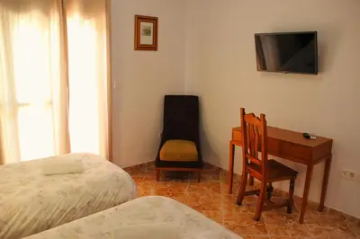 Cama o camas de una habitación en Hostal la zamora
