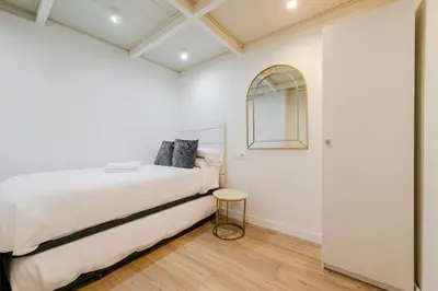 Cama o camas de una habitación en Duplex Dreams de Sevilla Barrio Santa Cruz