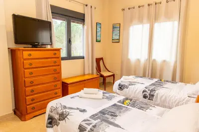 Cama o camas de una habitación en Villa Sueños
