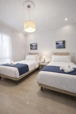 Cama o camas de una habitación en HOME TENDILLAS