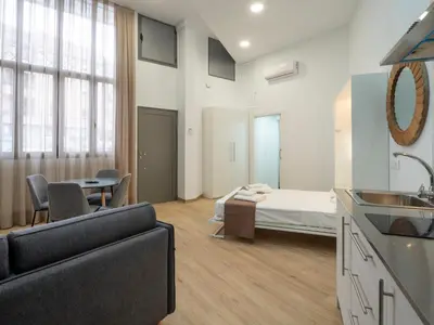 Cama o camas de una habitación en Apartamentos La Fuensanta
