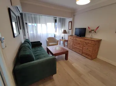 Una televisión o centro de entretenimiento en Apartamento Celia