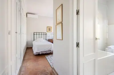 Cama o camas de una habitación en Casa del Monte Sevilla