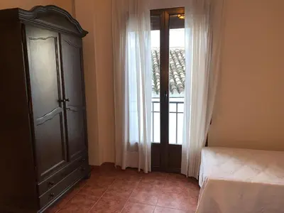 Cama o camas de una habitación en La Plaza