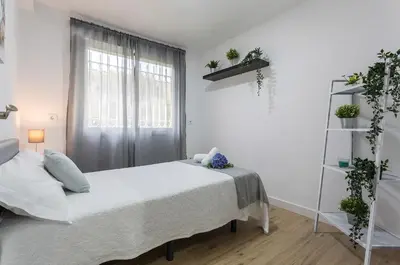 Cama o camas de una habitación en Centro Virgen Guia 3 Rooms