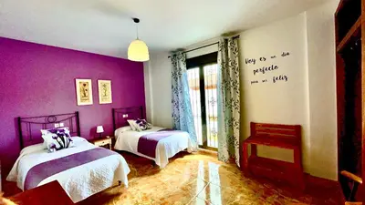 Cama o camas de una habitación en Villa Jardín
